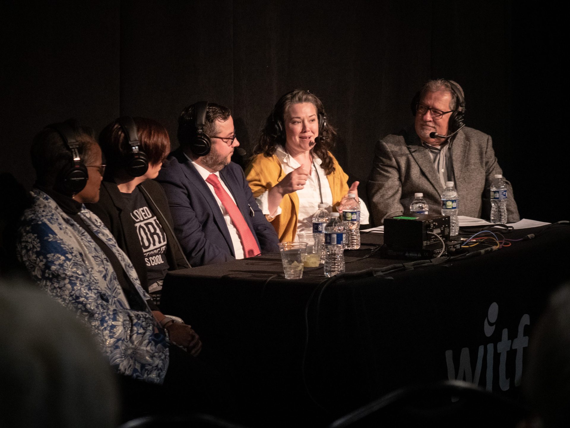 Smart Talk host Scott LaMar speaks with a panel at the Fulton Theatre